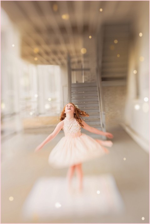 Young girl makes a wish and twirls in a sparkling dress in this magical photo by Ristaino Photography of Sarasota FL
