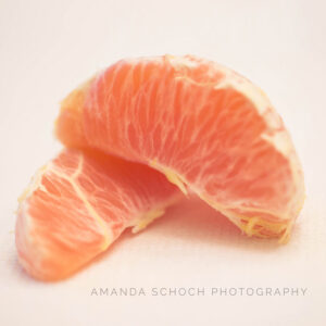 two simple orange slices on a white background