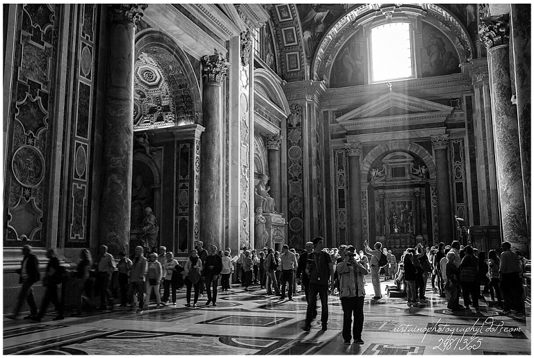 Sun streams through the window at St Peter's Basilica in Rome taken by Ristaino Photography of Sarasota FL