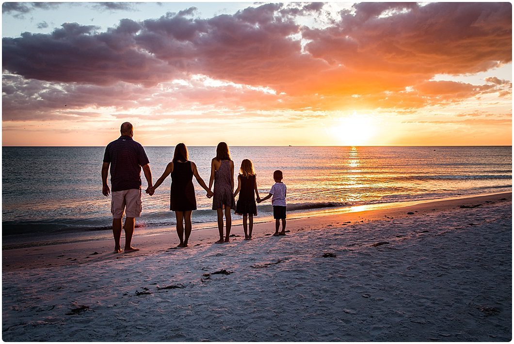 Siesta Key beach portraits at sunset by Sarasota Family photographer Michaela Ristaino Photography www.ristainophotography.com