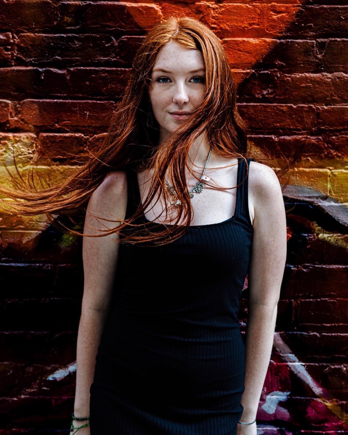 High school senior portrait at downtown Sarasota street mural, Ristaino Photography