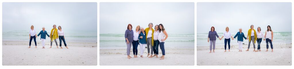 Women of different ages posing together and holding hands during a Sarasota friendship photography session on a cloudy beach, capturing connection, joy, and individuality.

