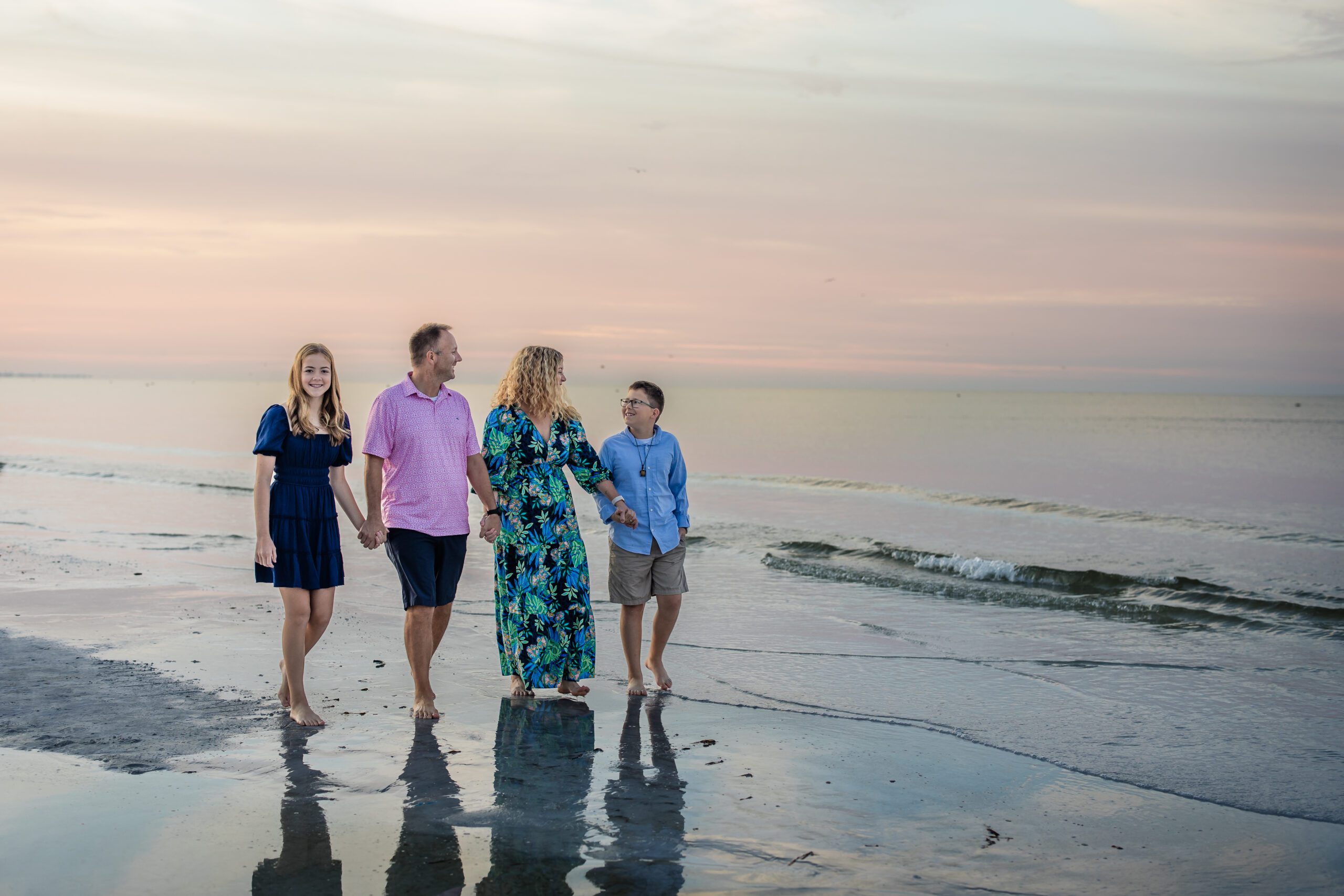 Family mini session on Siesta Key beach at sunset, Sarasota