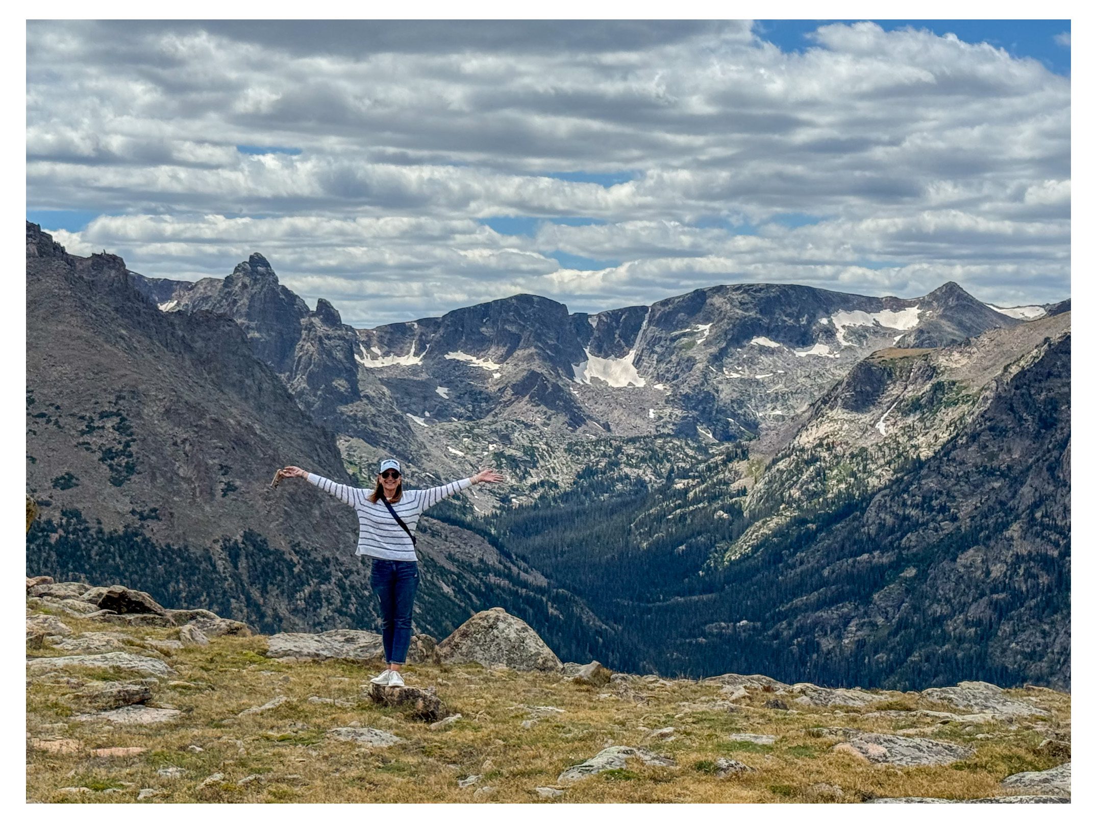 Michaela exploring the Colorado mountains, one of her favorite places to recharge and find inspiration.
