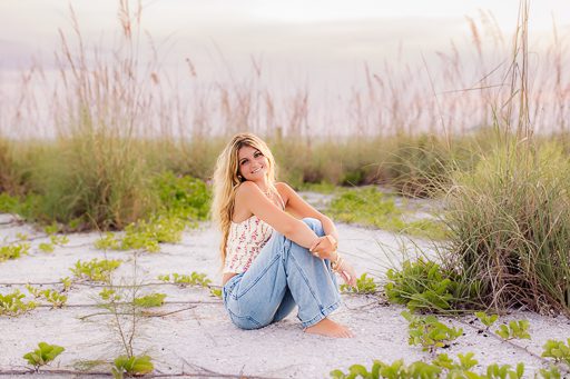 Senior portrait sitting in coastal dunes, Sarasota