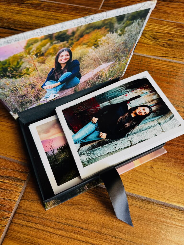 Personalized senior year photo album with name and cover portrait, printed keepsake from a Sarasota senior session