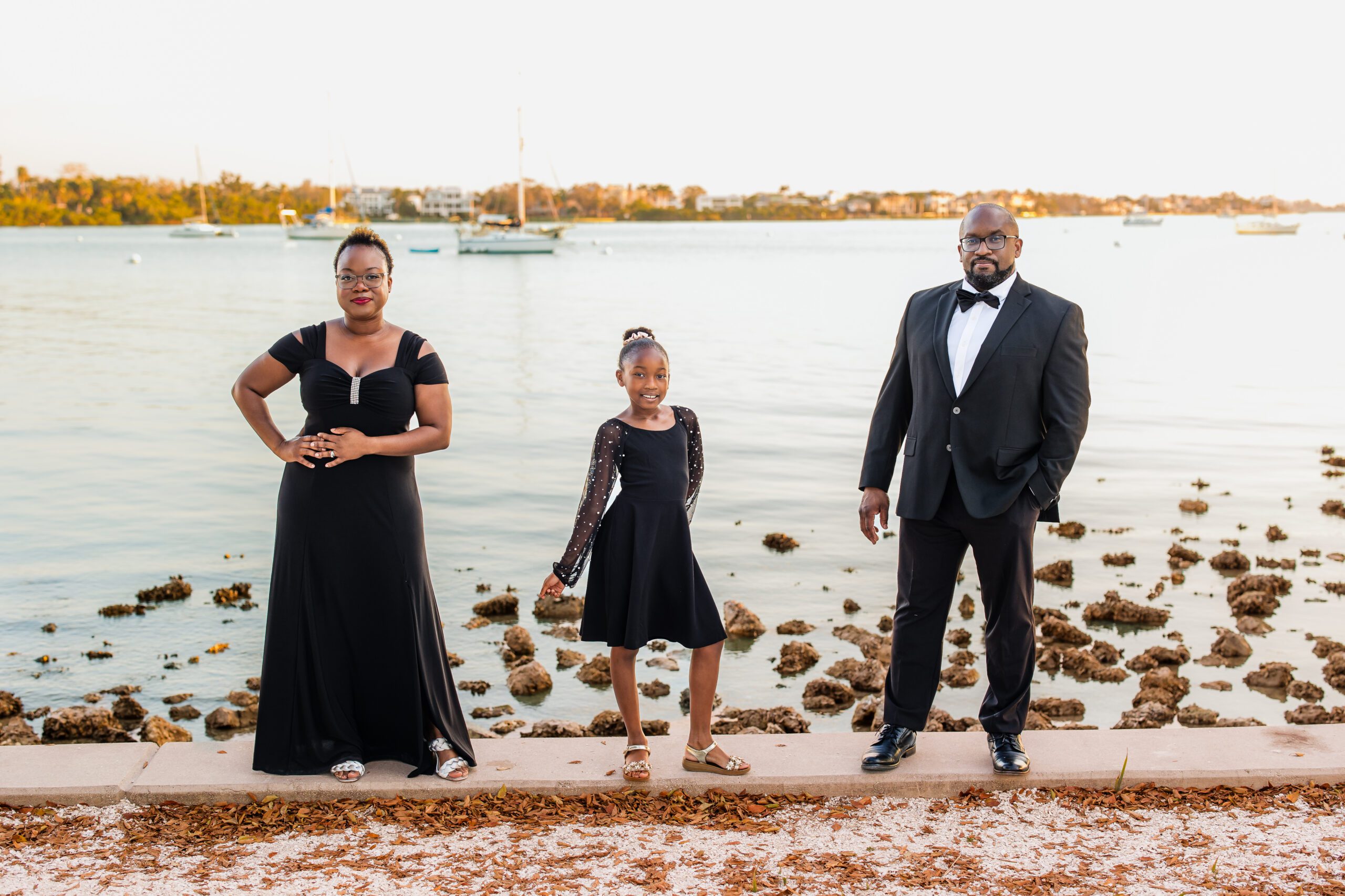 Family mini session at Sarasota Bayfront with downtown skyline